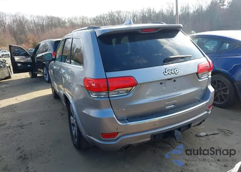 2014 Jeep Grand Cherokee Overland z USA, uszkodzony, nr VIN 1C4RJFCG1EC247145